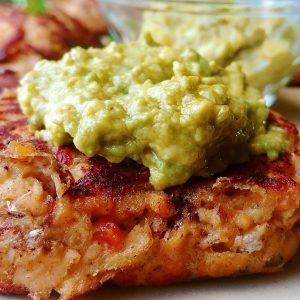 These salmon burgers are perfect enough to eat on their own. However, when dressed with the guacamole, the flavors will explode in your mouth. Perfect for night that calls for an easy quick dinner. Savory Thoughts | Salmon Burger with Guacamole. #salmonburger #salmonpatties #patties #salmoncakes #guacamole #homemade #easyrecipe #easyrecipesalmonburger #easysalmonburger #easysalmonpatty