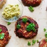 These salmon burgers are perfect enough to eat on their own. However, when dressed with the guacamole, the flavors will explode in your mouth. Perfect for night that calls for an easy quick dinner. Savory Thoughts | Salmon Burger with Guacamole. #salmonburger #salmonpatties #patties #salmoncakes #guacamole #homemade #easyrecipe #easyrecipesalmonburger #easysalmonburger #easysalmonpatty