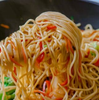 This Vegetable Lo Mein Recipe is prepared with a handful selection of vegetables. It is ready in 30 minutes or less and contain ingredients such as sriracha sauce for a little heat, sesame oil, brown sugar and soy sauce to name a few.