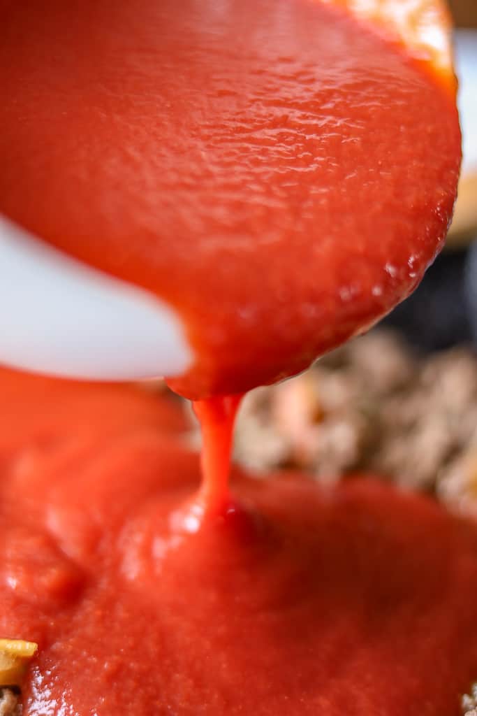 Beef Bolognese Recipe - Savor Thoughts Beef Bolognese Recipe - Savor Thoughts. Tomato Sauce being added to the beef.