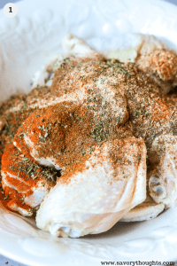 Uncooked wings topped with Jamaican Jerk Seasoning