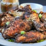 Jamaican Jerk Chicken Wings – flavorful, ridiculously delicious, and easy to make right in your kitchen. No need to travel to the local Caribbean store to get these wings. These wings are full of spice and extremely addictive. #Jamaicanjerkwings #spicywings #jerkwings #jamaicanrecipe #homemadeseasoning #jerkseasoning