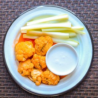 Air Fryer Buffalo Cauliflower Wings are quick and easy buffalo cauliflower bites appetizer to serve all year. They taste wonderful and are a great way to sneak in some veggies while enjoying the flavors you love. These vegan cauliflower wings not only easy to make, but are the perfect air fryer cauliflower appetizer you’ll want to serve to your family and friends. These little air fryer wings are so worth the time and effort as they are crispy but yet tasty. You’ll definitely not miss having chicken with these little cauliflower bites. Learn to make this vegan cauliflower recipe with just a few ingredients. I’ve even included on how to barbecue cauliflower wings. Cauliflower wings are Keto, Gluten-Free, Paleo, Low Carb, and satisfy Whole30 diets.