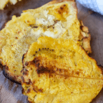 Healthy and easy Haitian bannann peze, Air Fryer Plantains recipe. If you love fried foods, and more importantly, fried plantains, then you’ll fall in love with these air fried green plantains. They are the easiest, healthiest, and most addictive homemade snack you’ll want to make over and over again. Fried plantains calories are extremely low and most often don’t require oil when making them in the air fryer. They serve well as healthy appetizers. Haitian fried plantains are usually fried twice, so I have taken the liberty in following the same steps while providing a healthier way to fry these little babies. whether you are making fried plantains that are sweet or just learning how to make sweet fried plantains, the method is extremely easy, and you are minutes away from enjoying a healthy homemade snack. These Fried plantains are healthy, gluten-free, Whole30 compliant, and paleo friendly.