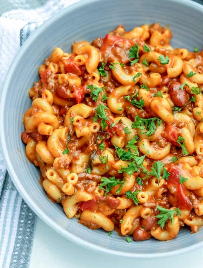 Instant Pot Chili Mac and Cheese. This Instant Pot Chili Mac And Cheese is totally ON POINT! Combine two of your favorite comfort foods in ONE POT to create the ultimate cheesy ONE POT MEAL. It is a hearty, quick, delicious, and comforting recipe for chili mac and cheese. Perfect for busy nights, one pot wonder chili mac and cheese recipe. This tasty chili mac and cheese is perfect for a family meal.