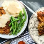 Chicken fried steak with mashed potatoes and green beans