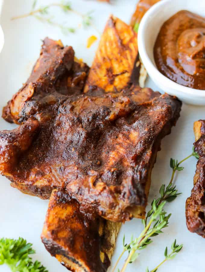 Instant Pot Beef Back Ribs are the most succulent fall-off-the-bone ribs. With this recipe, we bring a small taste of the Caribbean by coating it with a Homemade Mango BBQ Jerk Sauce. #instantpotbeefbackribs #howtocook #BBQbeefribs #pressurecookerribs