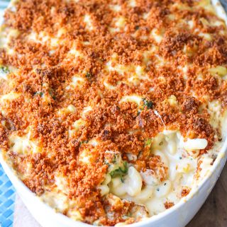 Baked Mac And Cheese with Broccoli wonder that's prepared with a homemade cheese sauce, broccoli, and completed with a crunchy bread crumb topping! #bakedmacandcheese #withbreadcrumbs ##homemade ##best #cheesy ##casserole ##withbroccoli