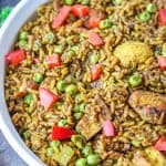 Unbelievable Caribbean Chicken and Rice recipe that's flavorful and make an easy one-pot meal which is perfect for meal prep. #chickenandricedbaked #caribbeanchickenandrice #chickenricecasserolerecipes