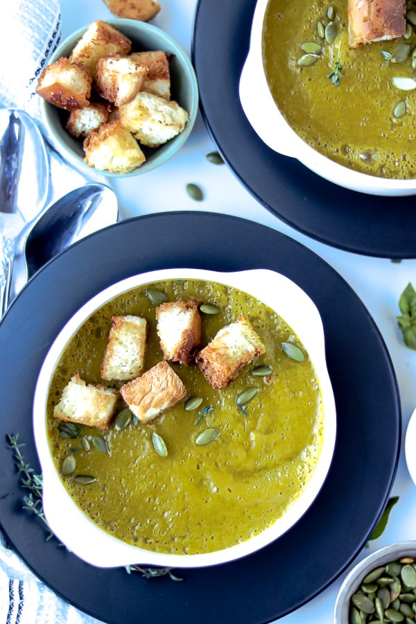 Green Soup Butternut squash soup topped with croutons and pumpkin seeds