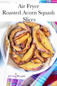 Pinterest Pin for Roasted Acorn Squash Slices in white white bowl