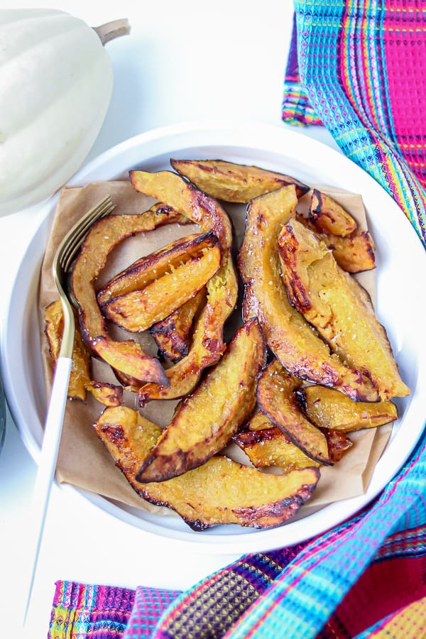 Air Fryer roasted acorn squash in white bowl