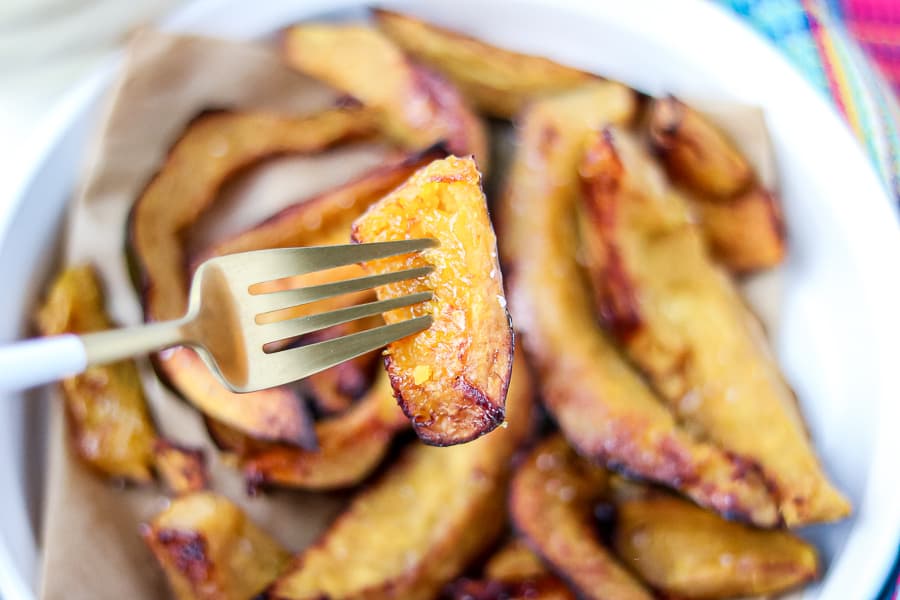 Roasted acorn on a fork