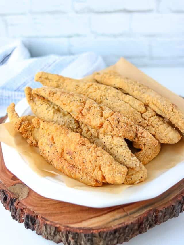 Southern Fried Whiting Fish on a white plate.