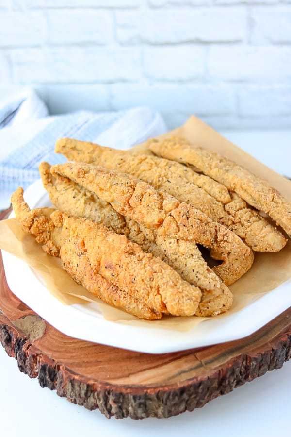 Southern Fried Whiting Fish on a white plate.