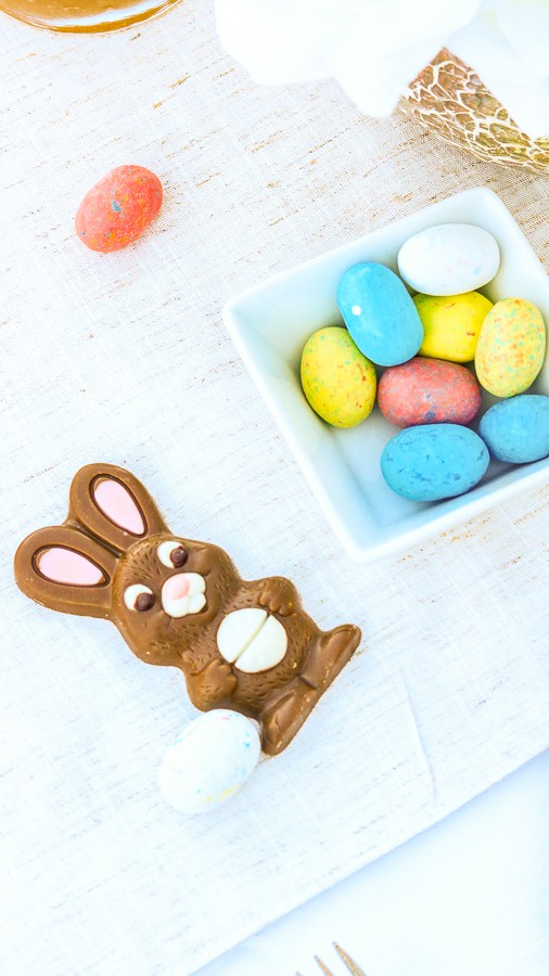 Chocolate Easter Bunny and Easter candy on the table