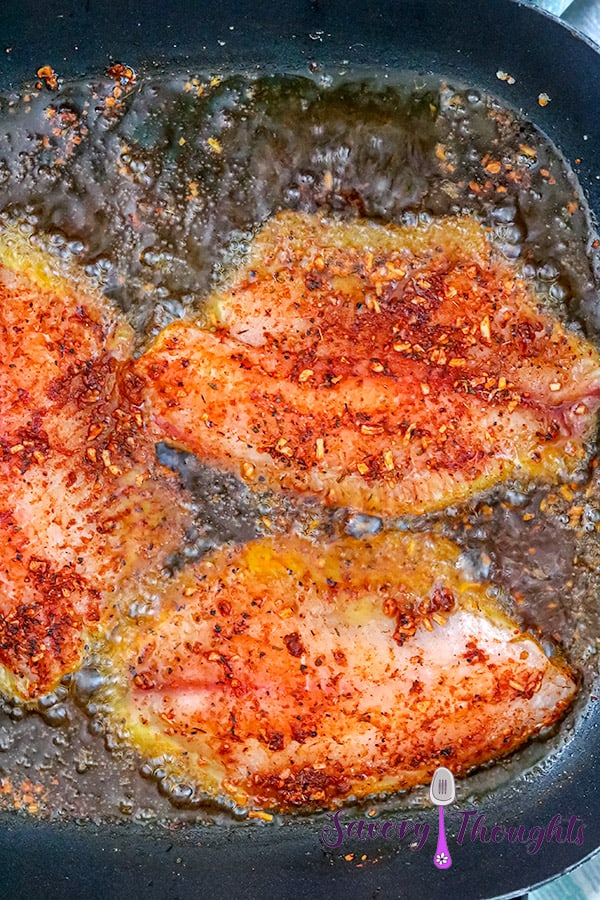 fish frying in oil