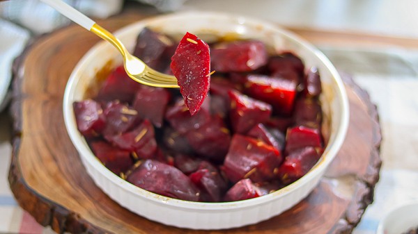 Cooked beets on a fork