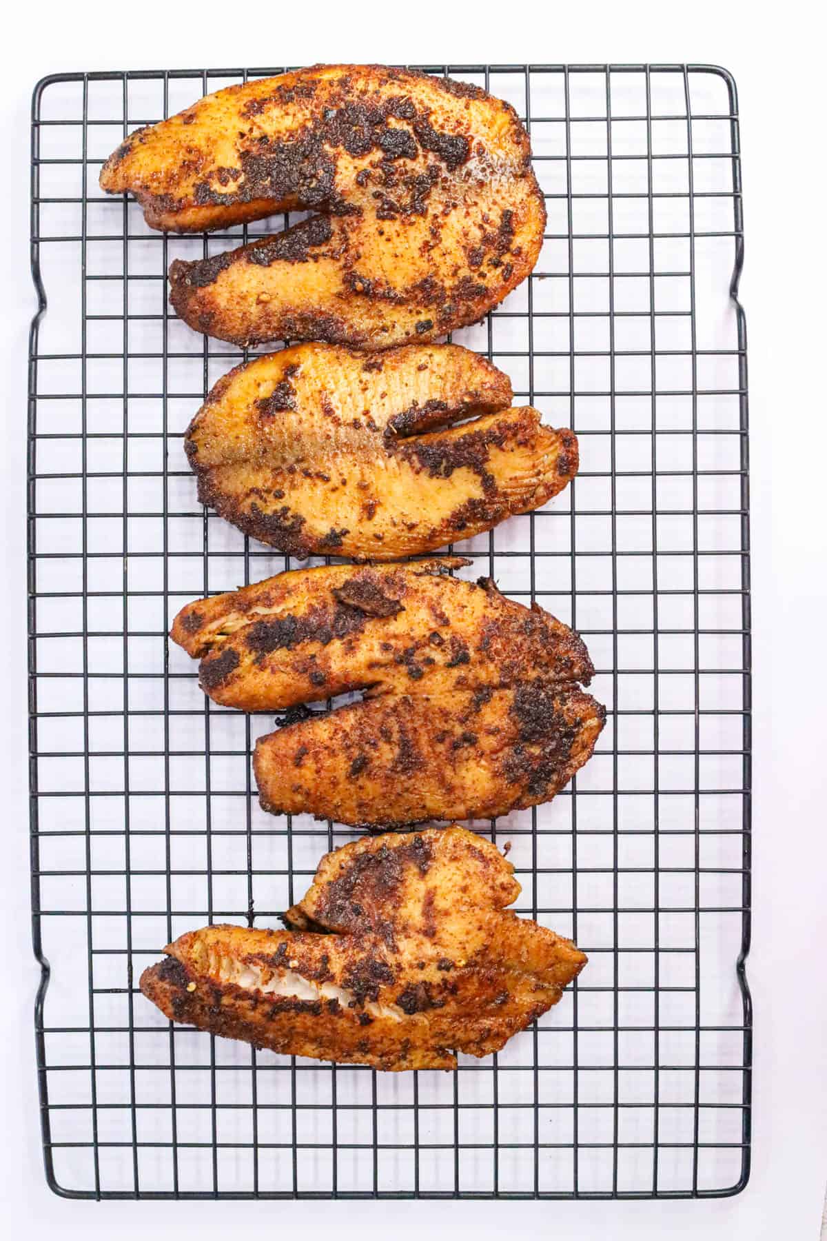 Easy Blackened Tilapia Recipe (Pan Seared & Flavor-Packed) on rack