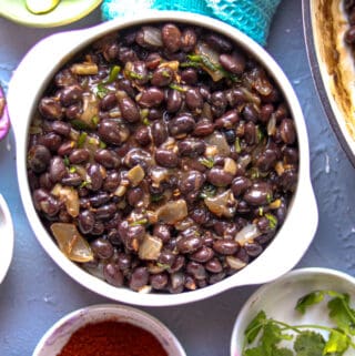 Black beans in white bowl