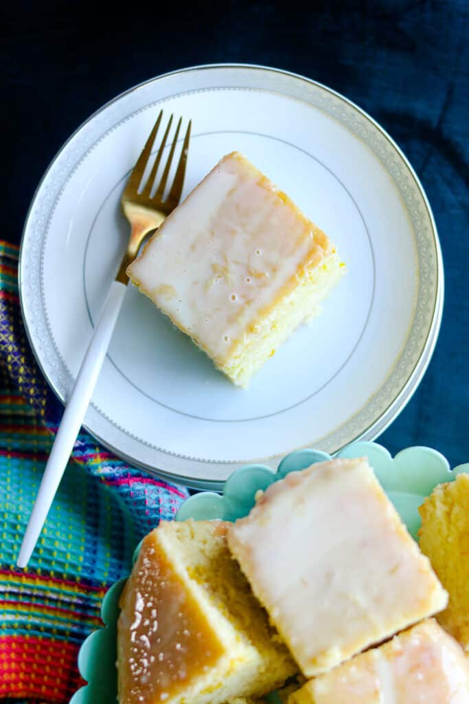 cake on white plate and fork