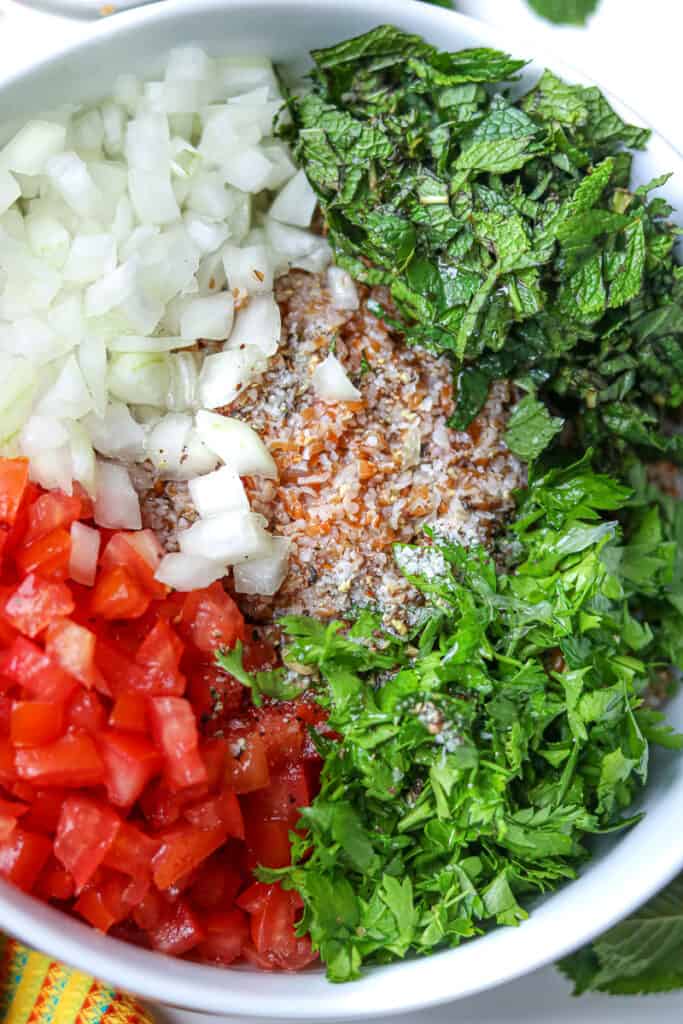 Tabbouleh Recipe Ingredients in large white bowl