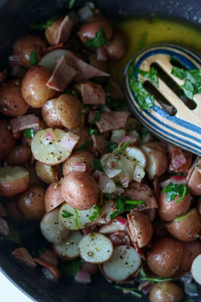 Potatoes mixed with herbs and bacon
