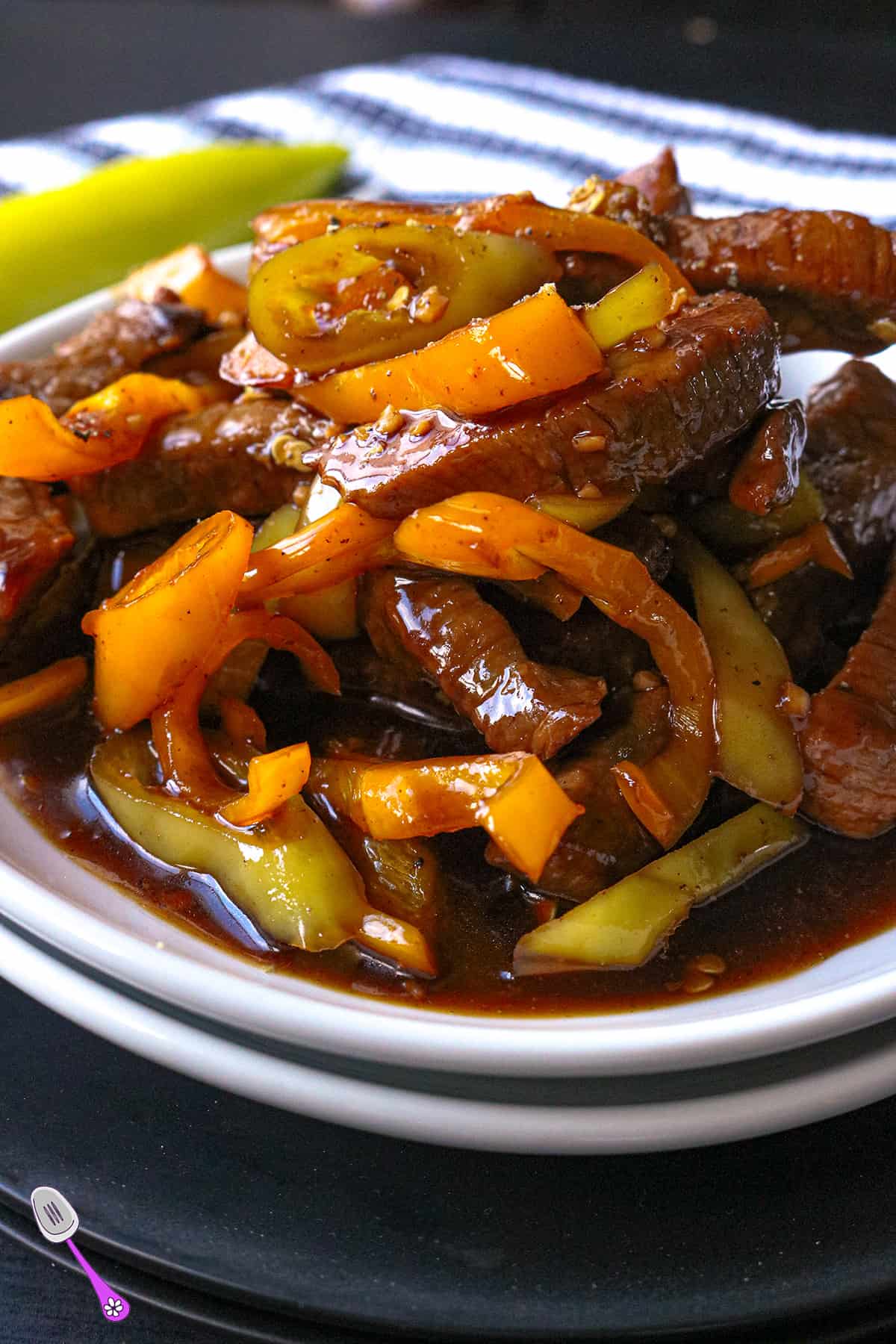 Pepper steak in white plate