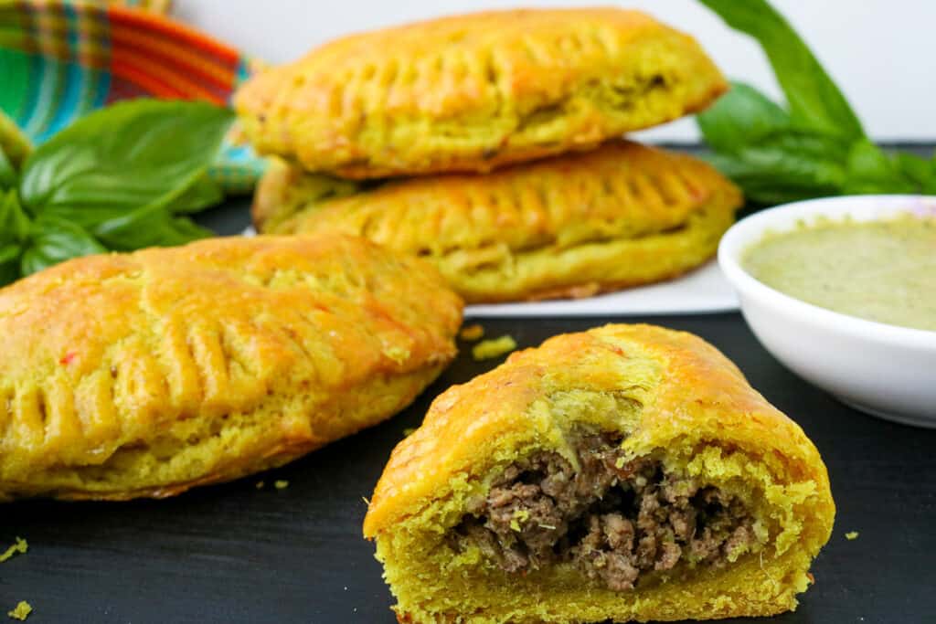 Jamaican Meat Pies Open Cut On Black board