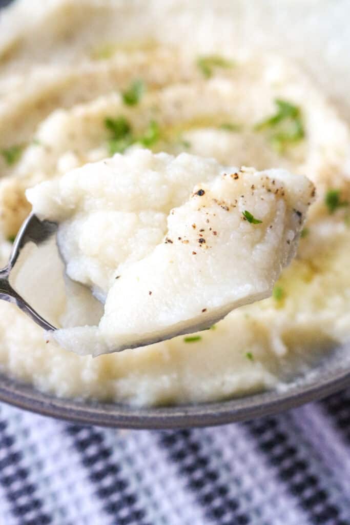 spoonful cauliflower topped with black pepper