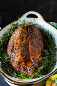 Turkey breast in dish with fresh herbs