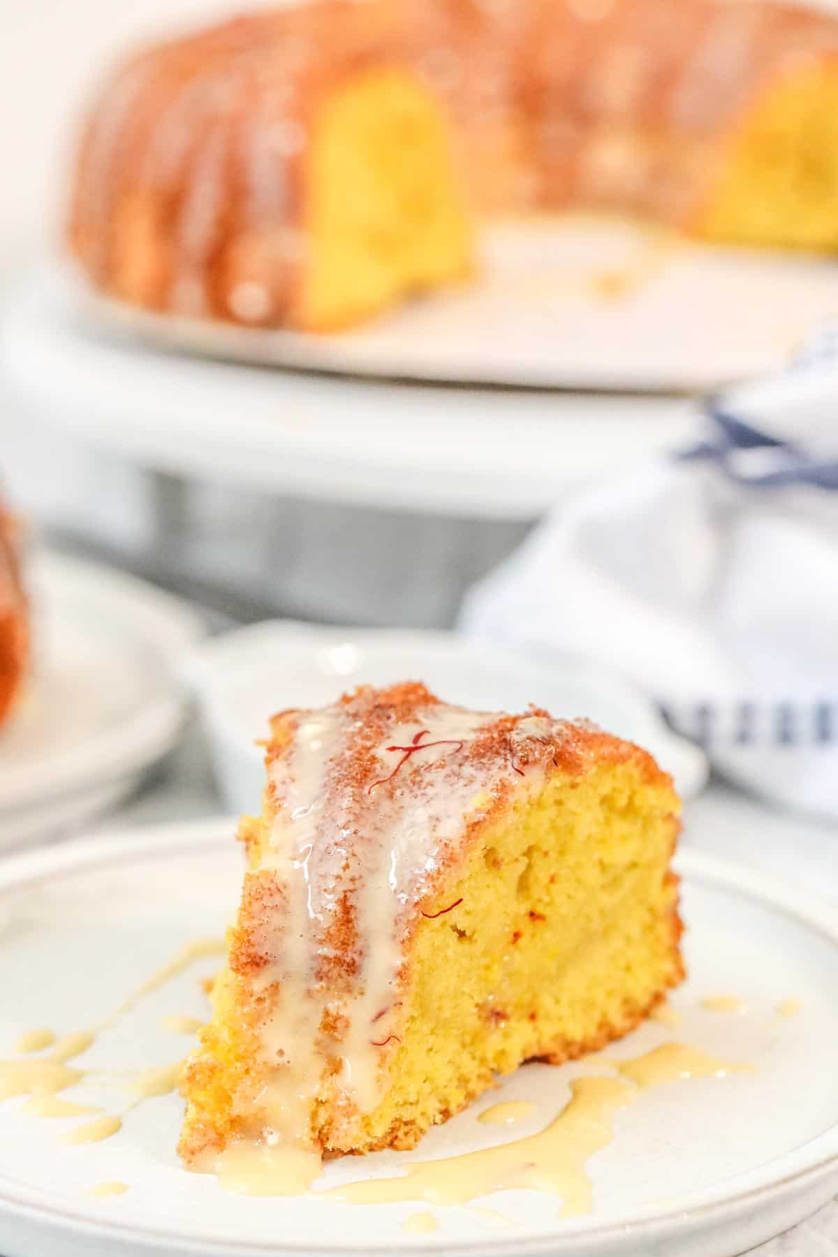 Saffron Cake drizzled with condensed milk frosting and sprinkled with saffron