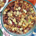 stuffing in baking dish with wooden spoon showing