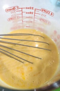 Whisk in milk egg batter mixture