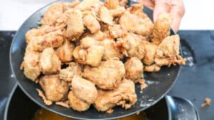 fried griot on black plate
