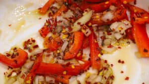 onion peppers and oil mix