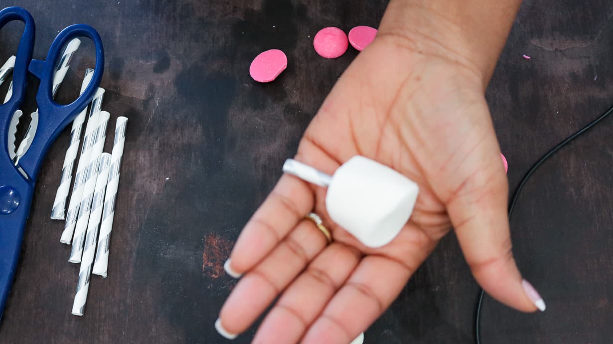 Jumbo size marshmallow in hand