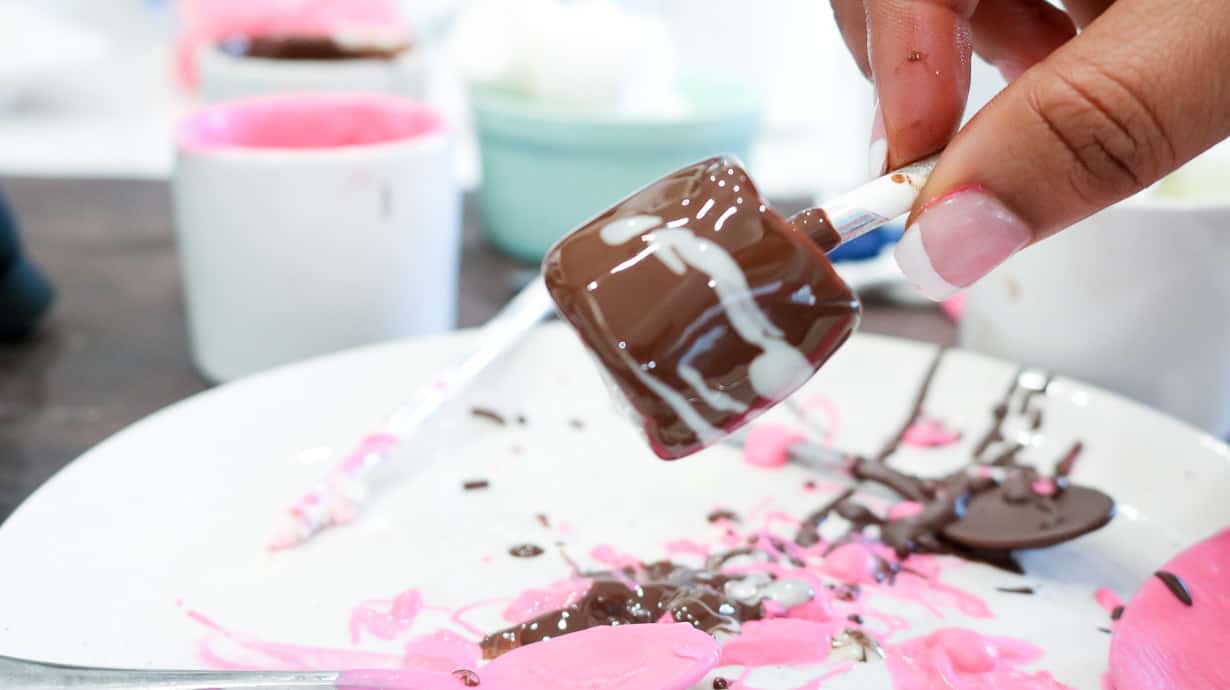 Decorating Marshmallows in chocolate