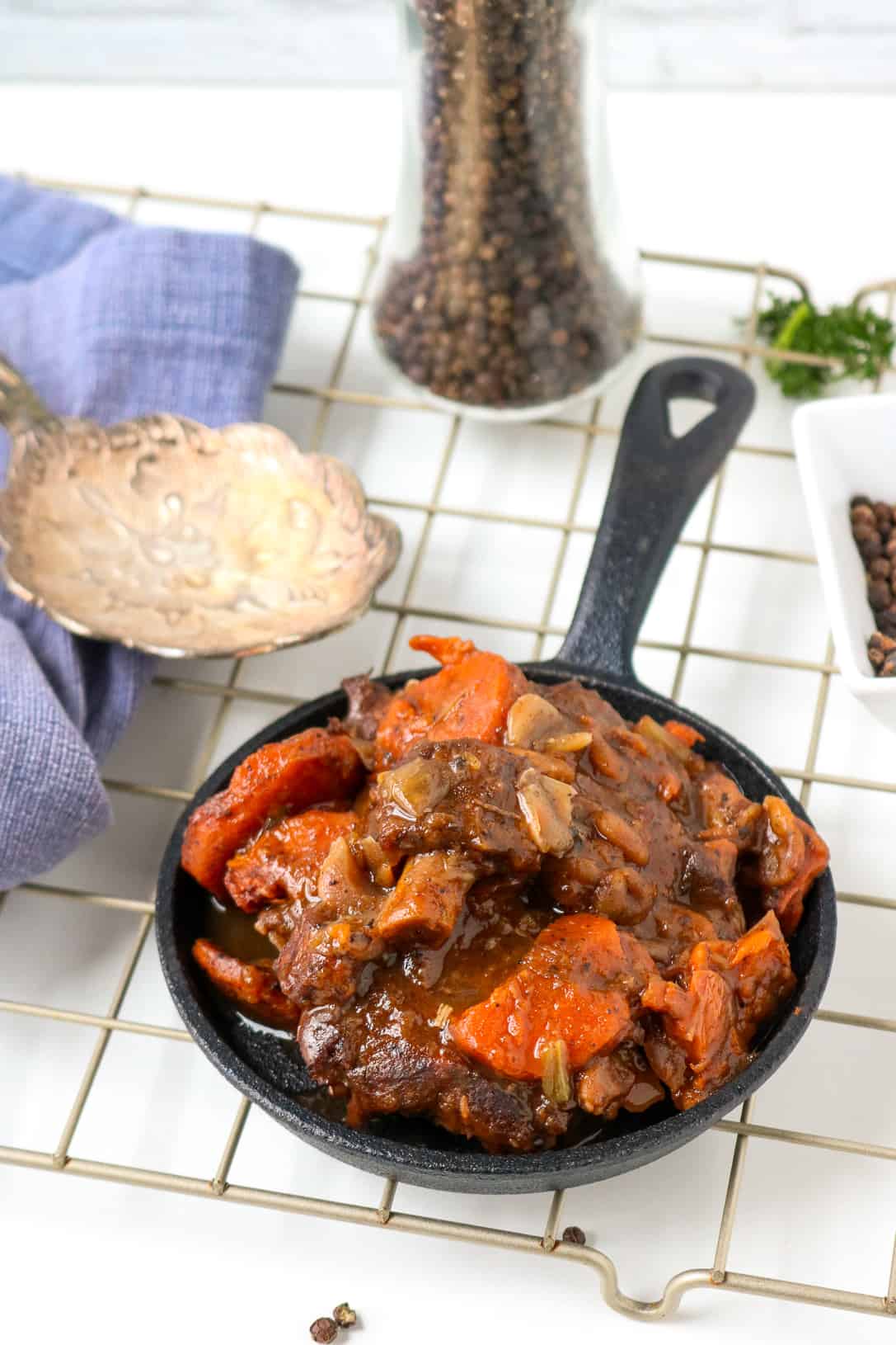 Cut up oxtail on large plate