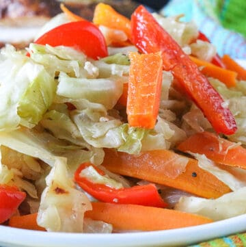 Jamaican Steamed Vegetables Topped With Carrots and Bell Peppers