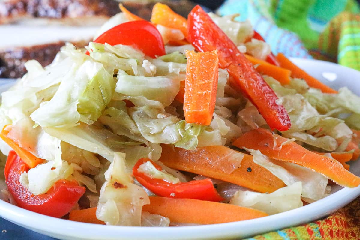 Jamaican Steamed Vegetables Topped With Carrots and Bell Peppers