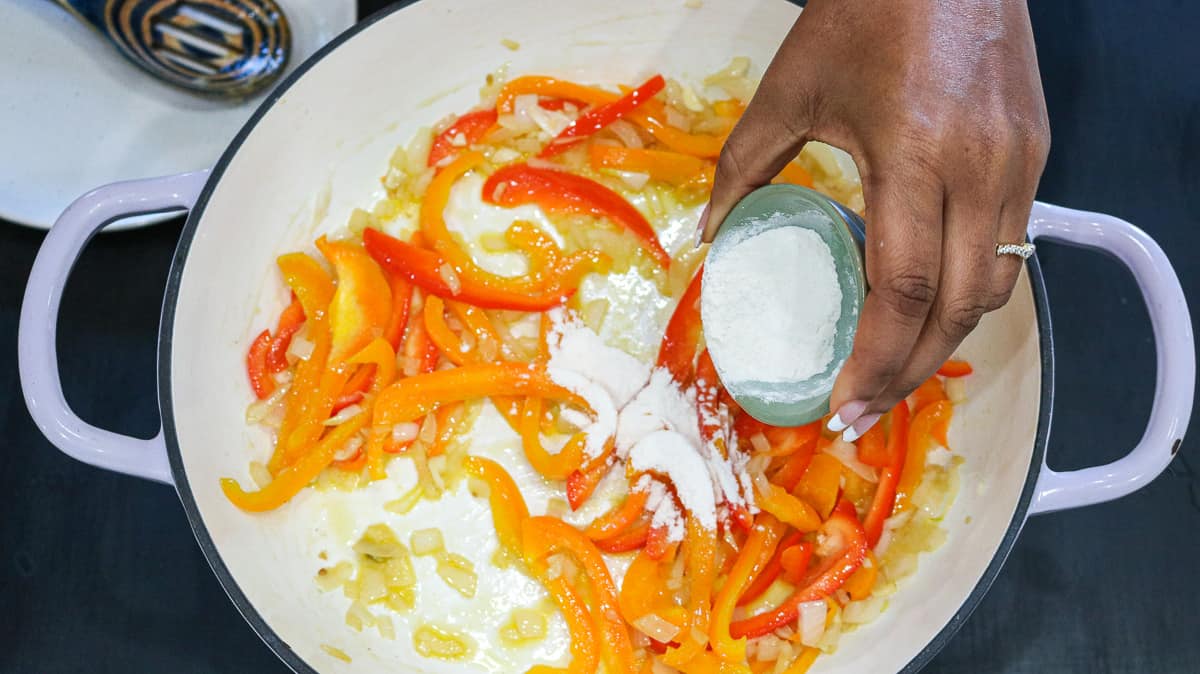 flour being added to peppers