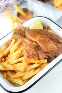 fish and fries on white plate