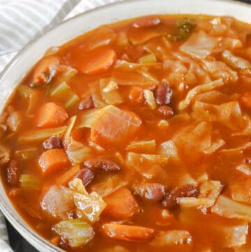 cabbage soup in white bowl