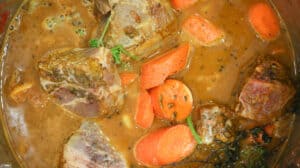 meat mixture in instant pot with carrots