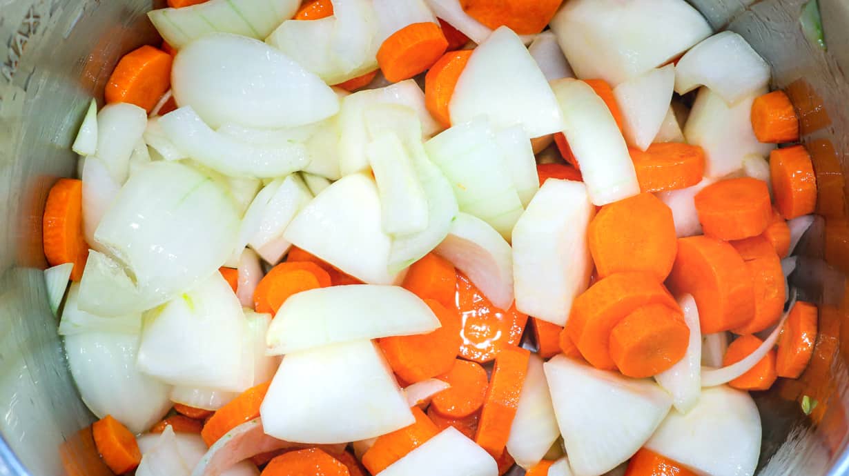 carrots and onions in pot
