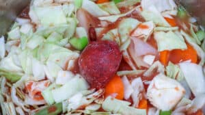 tomato paste and water added to cabbage