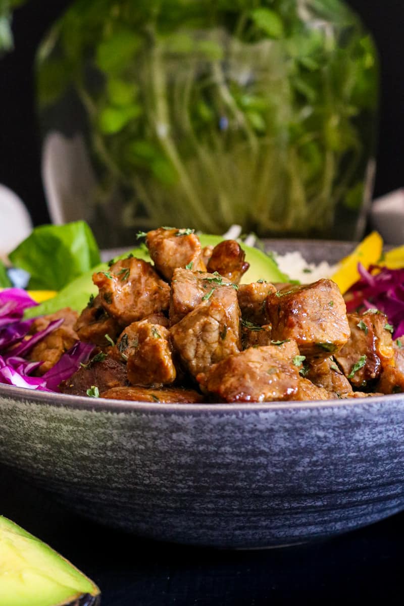 steak bites in gray bowl.