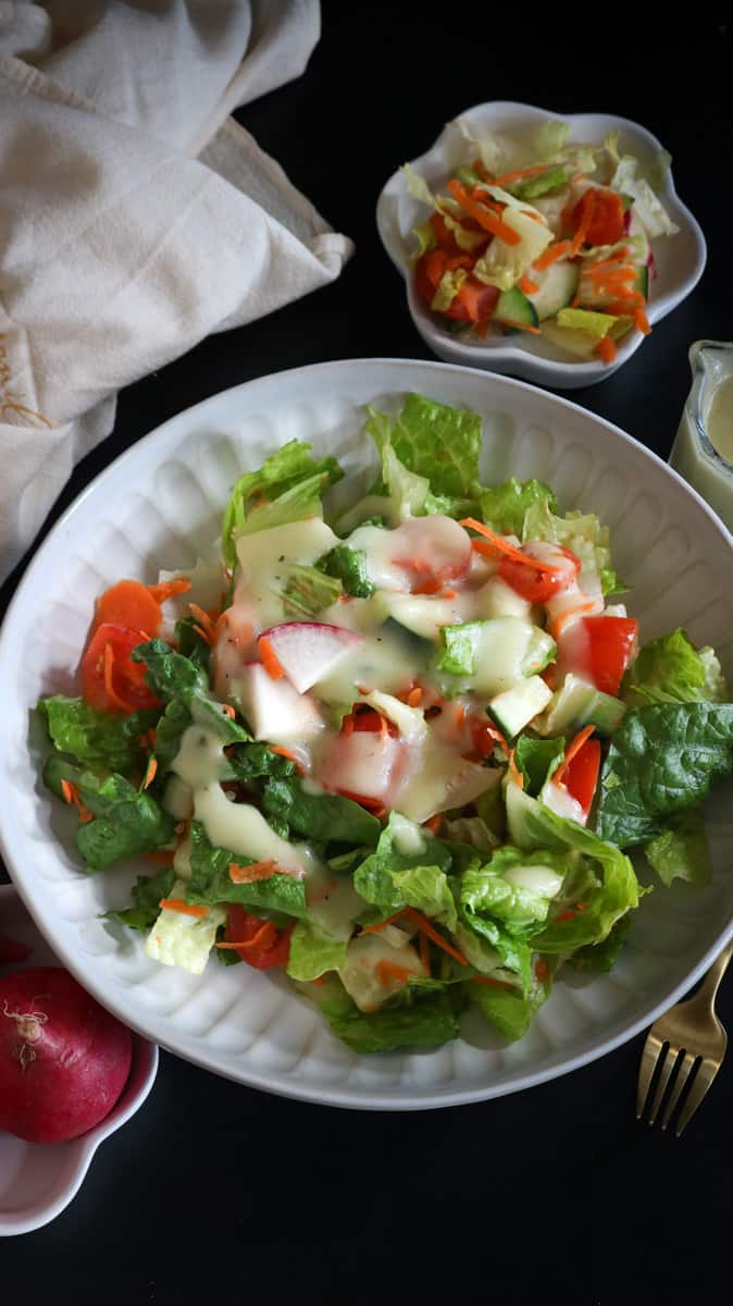 garden salad in white bowl