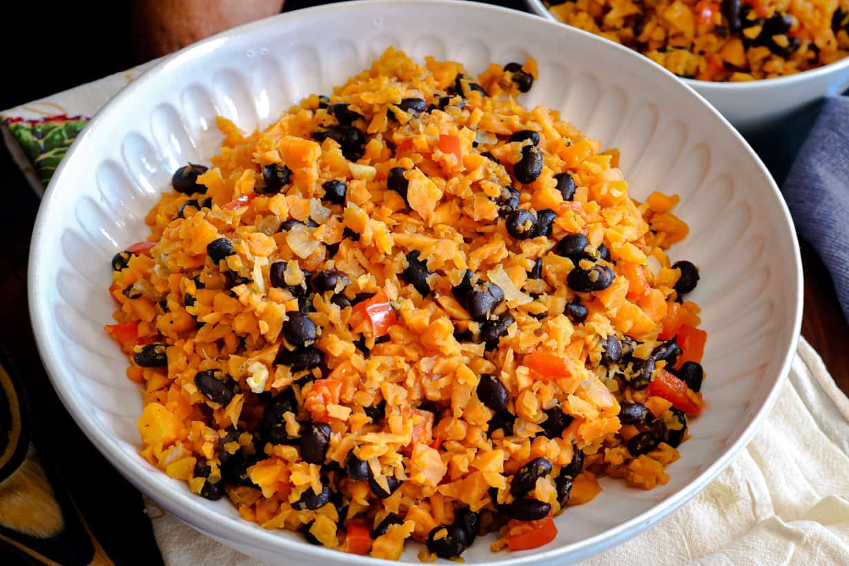 closeup picture of rice and beans in white bowl